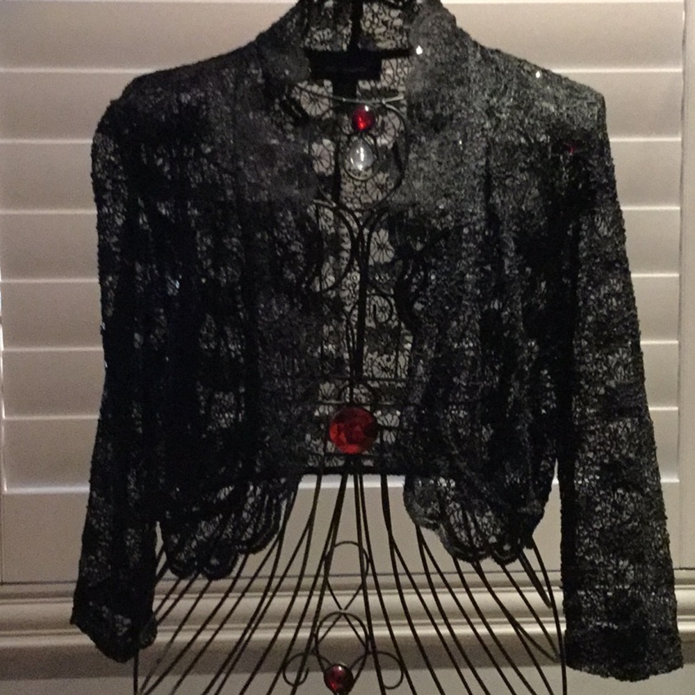 Beautiful top. Wear on top of tank or a dress
